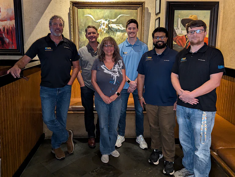 Photo of the BrokerPro team at our annual holiday dinner.