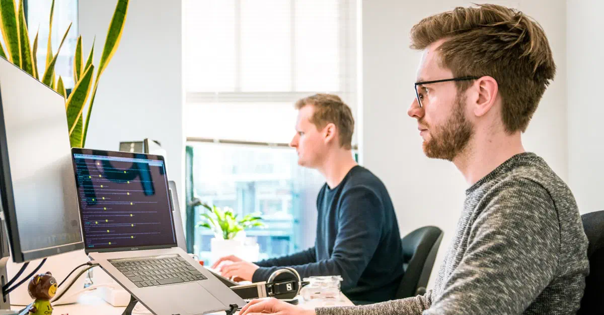 A photograph of a group of customer success engineers. A photograph of a group of customer success engineers.